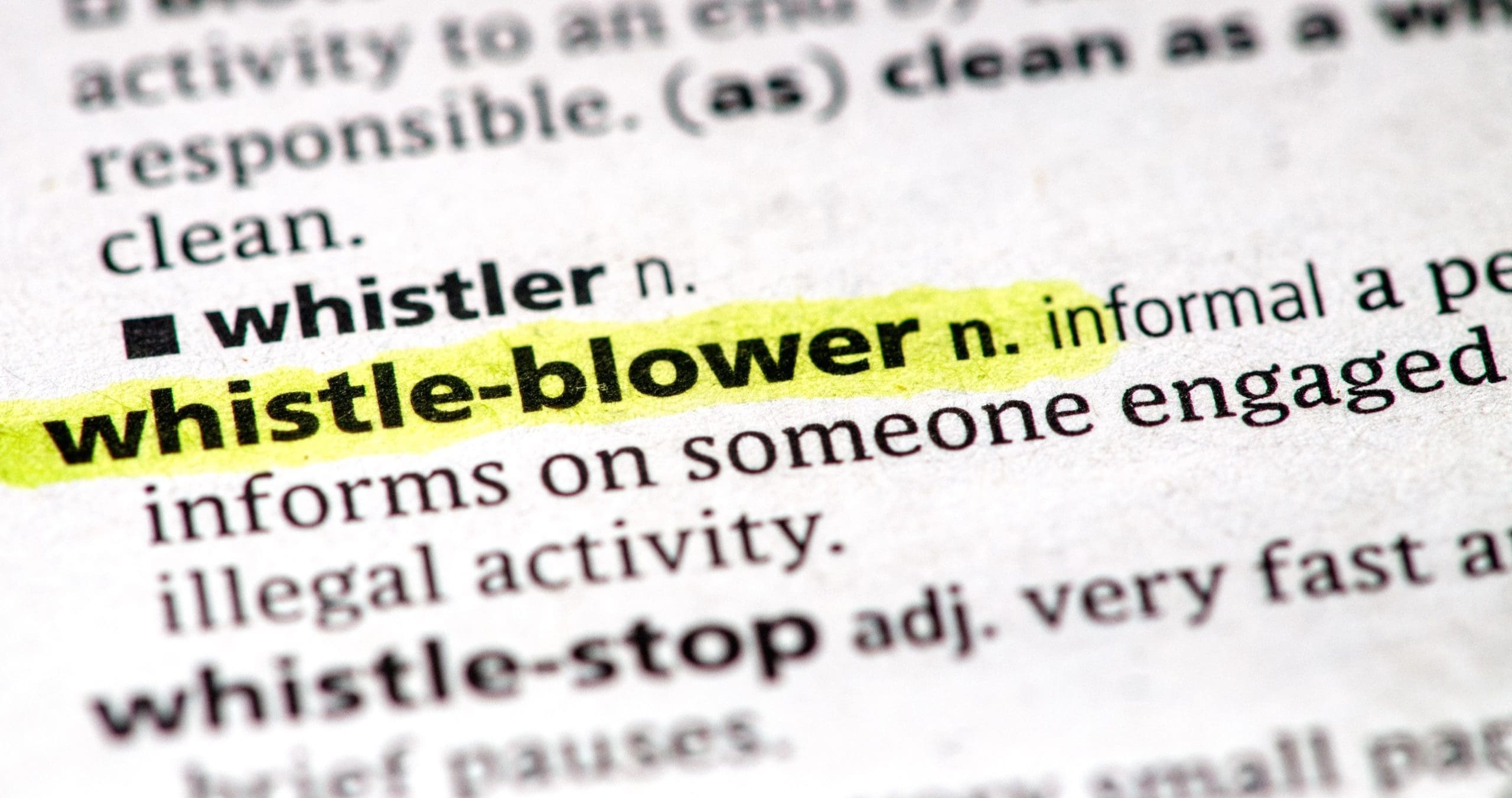 Image of a page from a dictionary with the word Whistle-blower highlighted